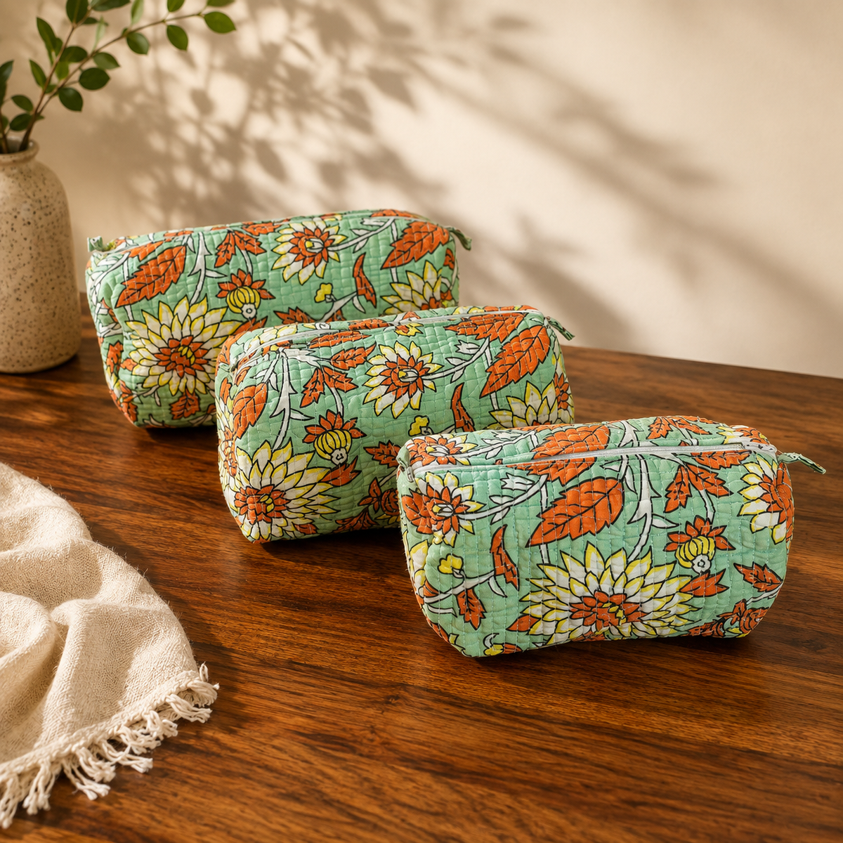 Harit green quilted cotton pouch set, front view