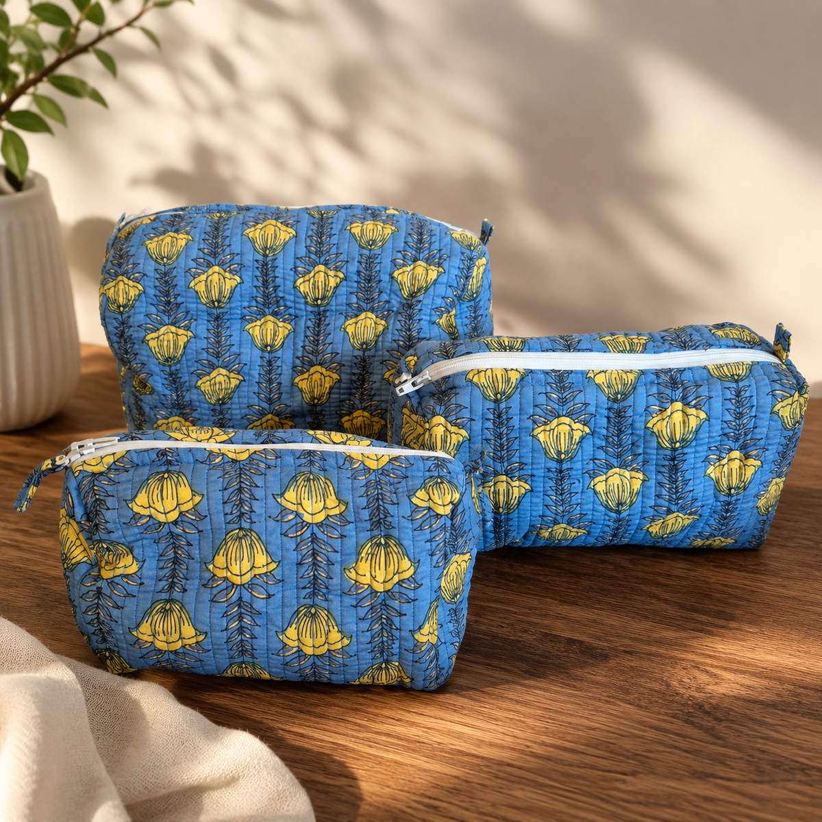Sona golden quilted cotton pouch set, front view