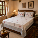 Ambari rust hand block printed bedsheet on bed