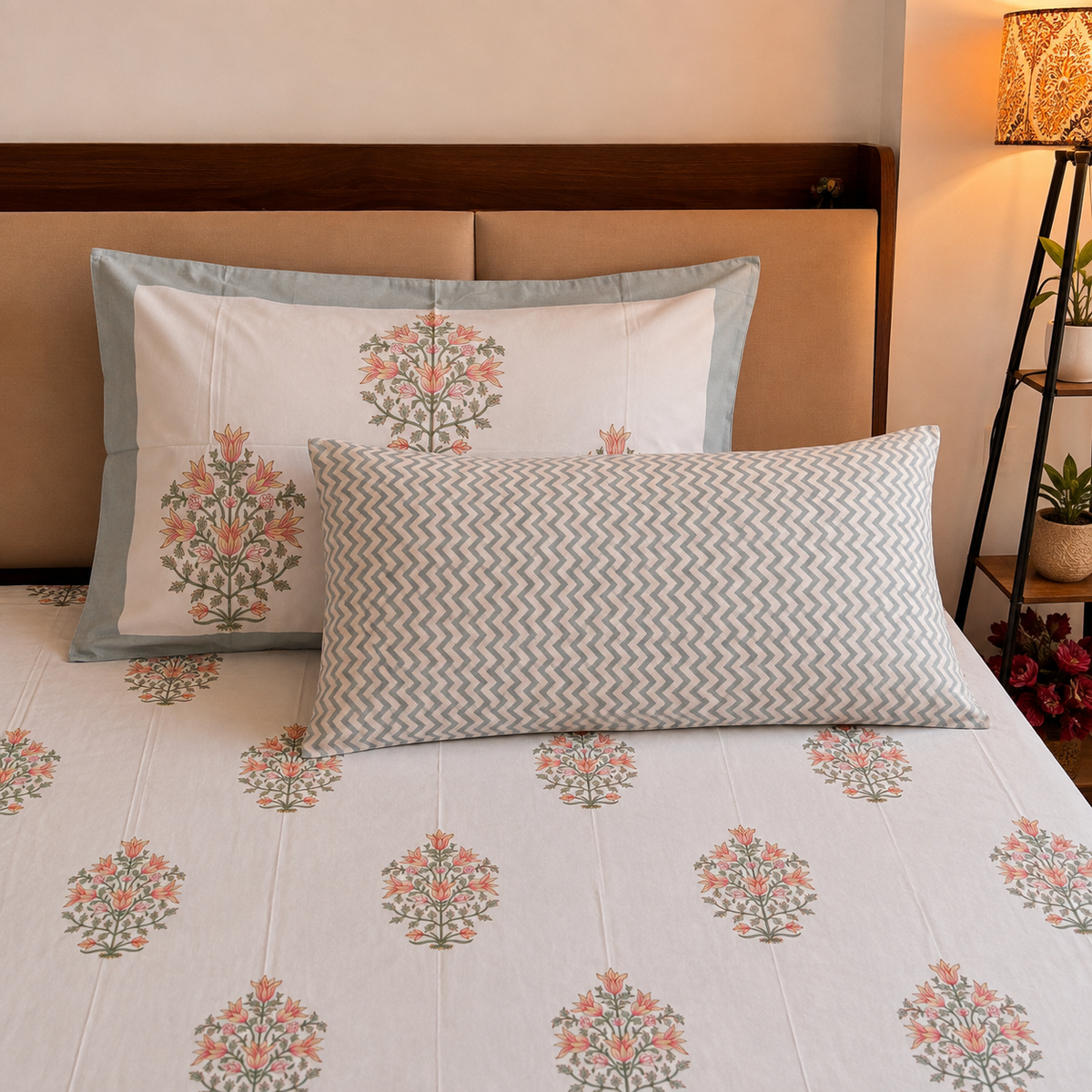 Kesariya orange hand block printed bedsheet on bed