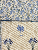 Sagar quilt border detail with indigo floral vine and palm tree print