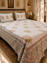 Orange and green motif bedsheet fabric detail