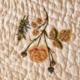 Close-up of Basant quilt rose motif